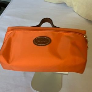 Longchamp makeup pouch.